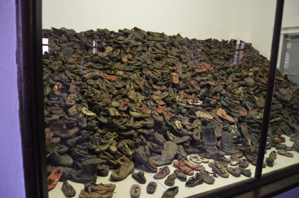 A portion of the shoes seized from the prisoners.  This collection is exclusively children's shoes.